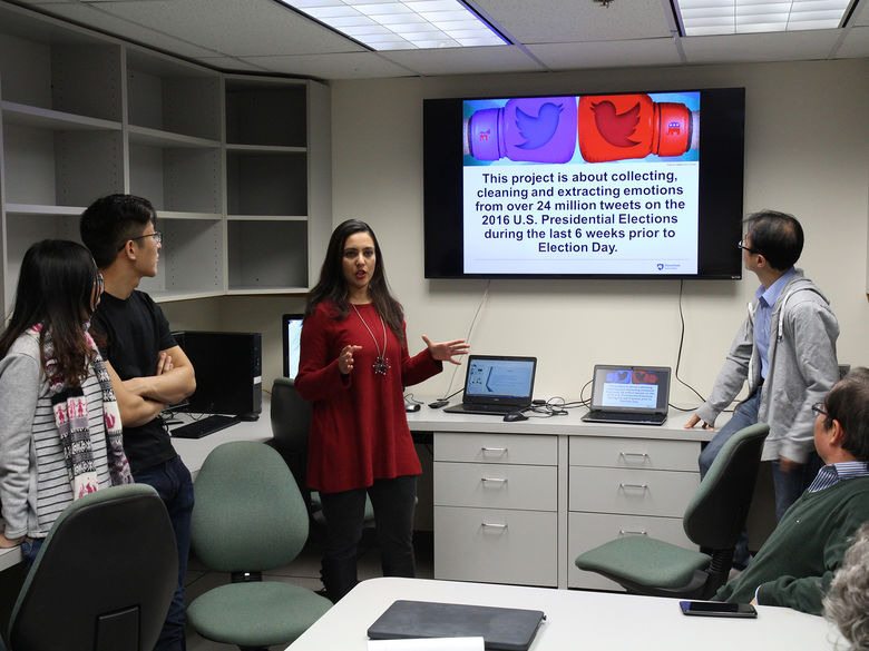 Students presenting a project in the Insights Lab